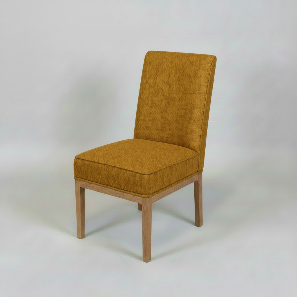 Gray upholstered chair with wooden legs on a light gray background