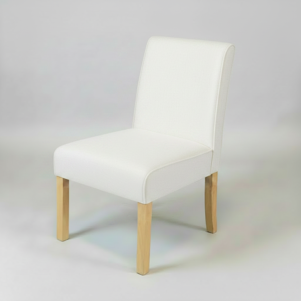 White chair with wooden legs on a light gray background