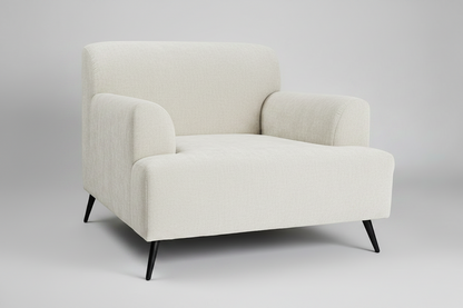 White armchair on a gray background