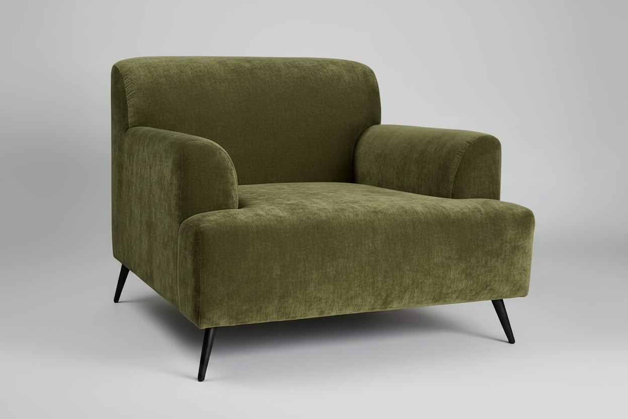 Green armchair on a gray background