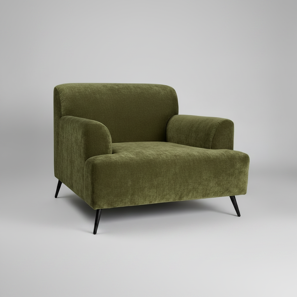 Green armchair on a gray background