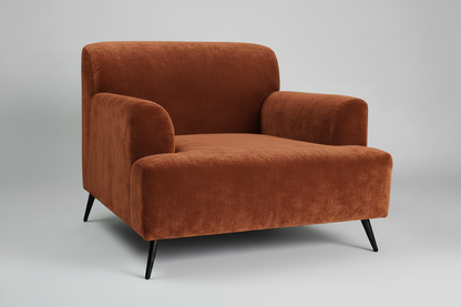 Brown armchair on a gray background