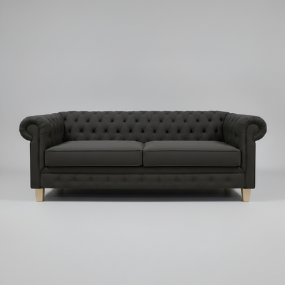 Black sofa with tufted backrest on a gray background