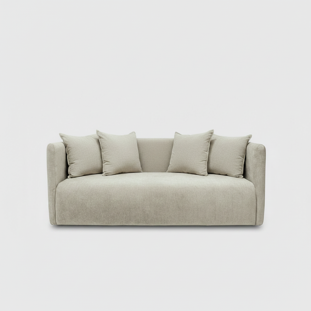 Beige sofa with four cushions on a light gray background