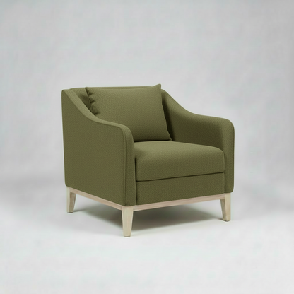Green armchair on a white background