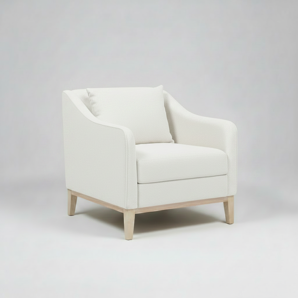 White armchair on a gray background