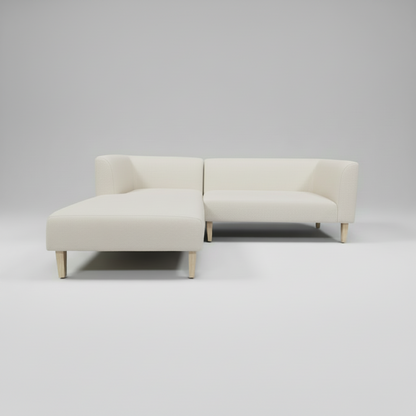White sectional sofa on a gray background