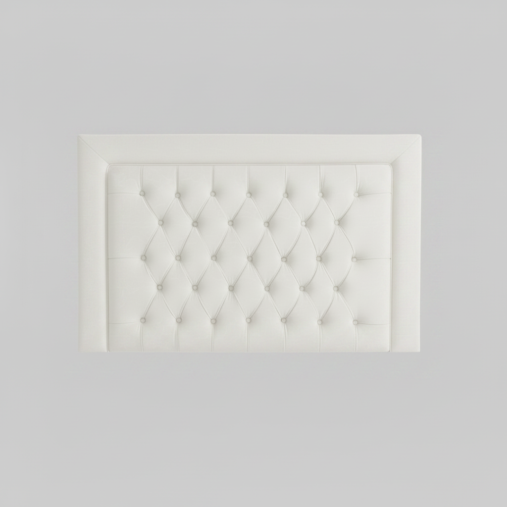 Black tufted headboard on a white background