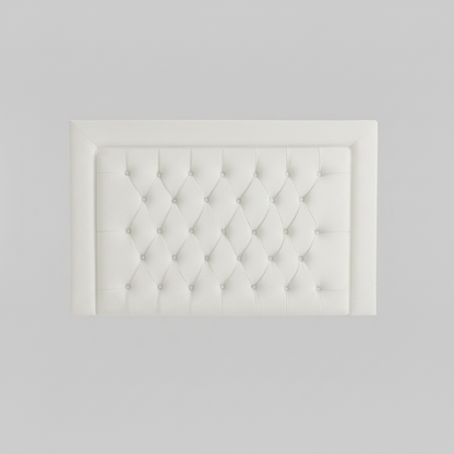 Black tufted headboard on a white background