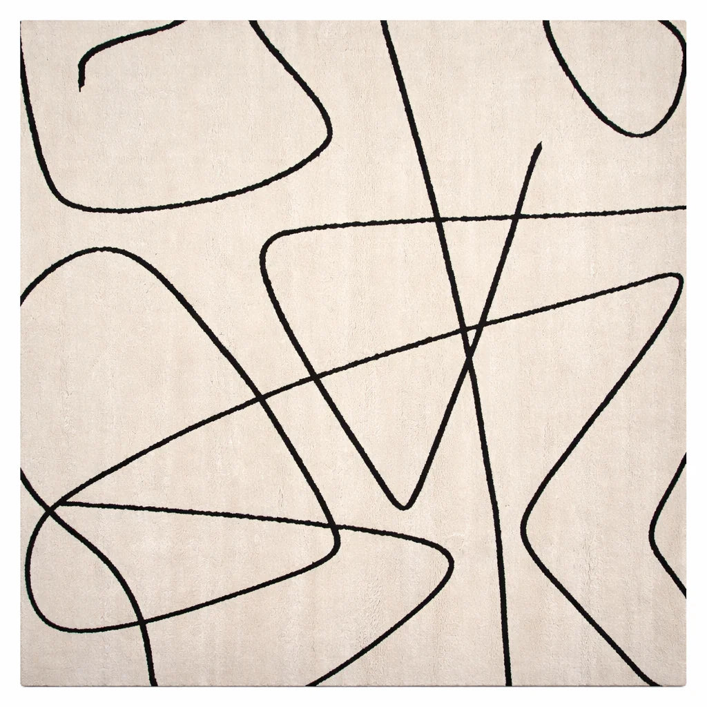 Beige rug with black abstract line design