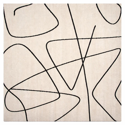 Beige rug with black abstract line design