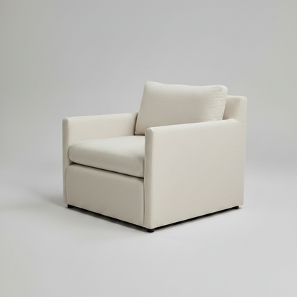 White armchair on a light gray background