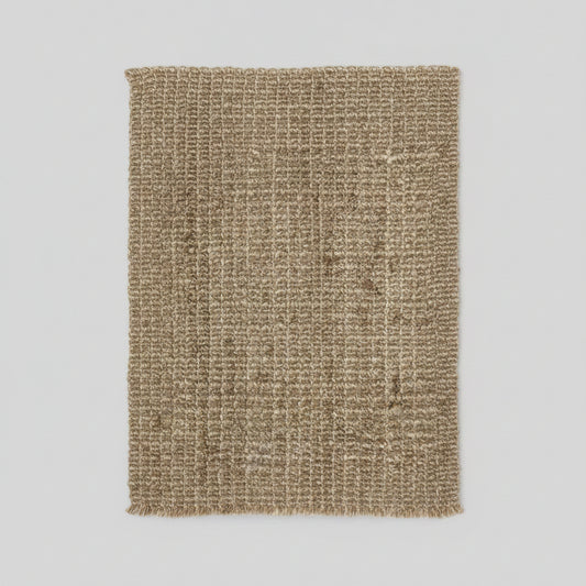 Close-up of a textured beige fabric pattern