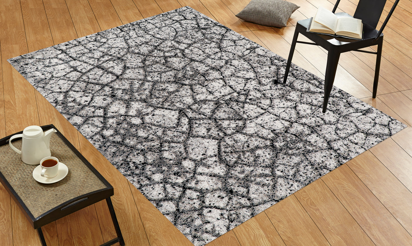 Lynx Gunpowder rug styled in a living room