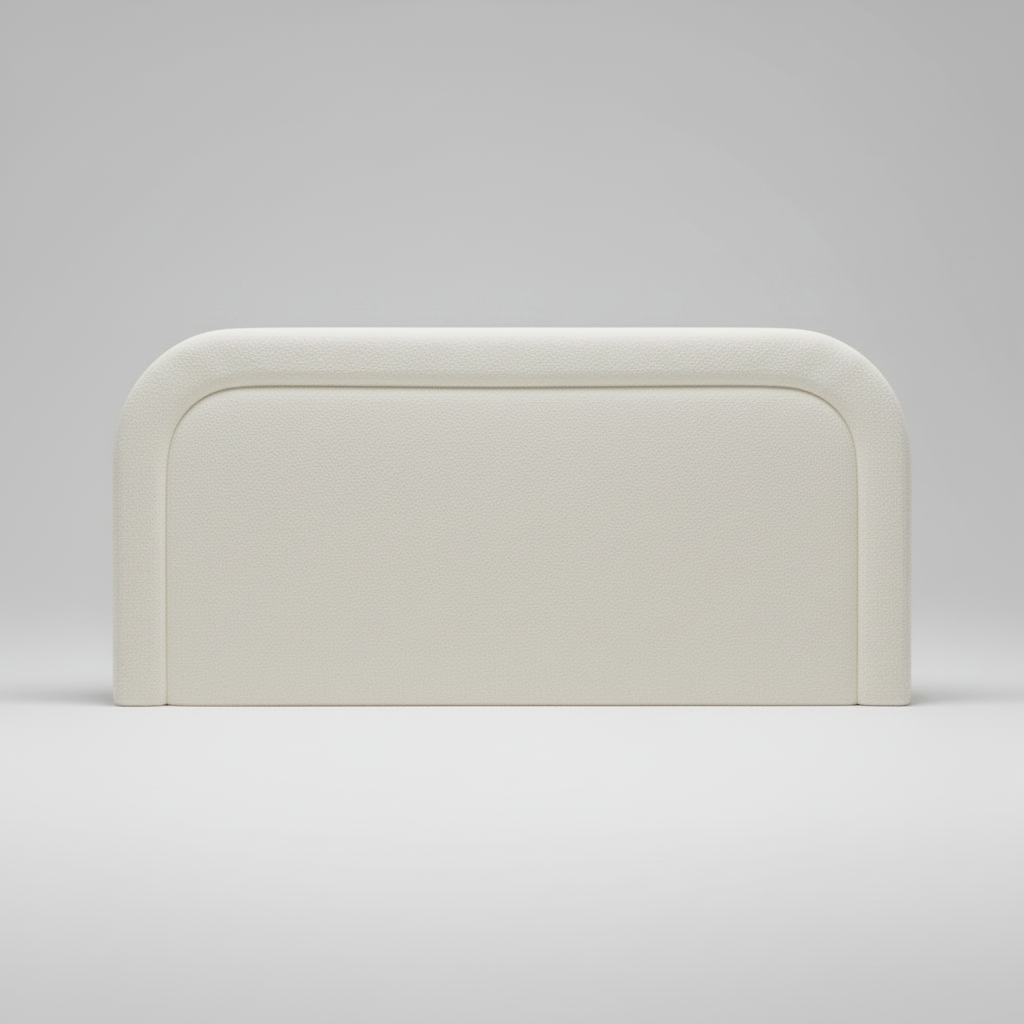 Beige upholstered headboard on a white bed with a light gray background