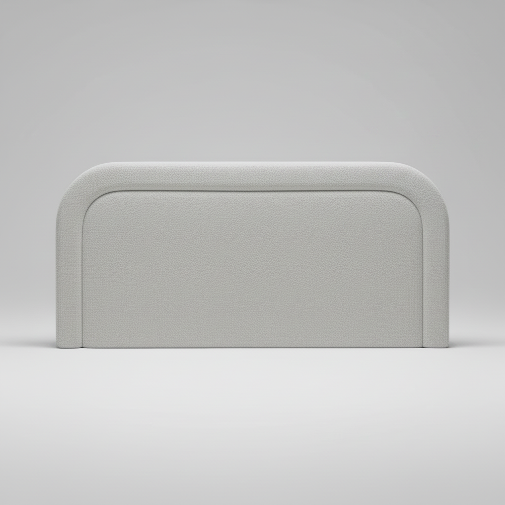 Gray upholstered headboard on a white bed frame against a light gray background