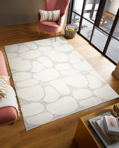 Mahe Sand Castle rug styled in a living room