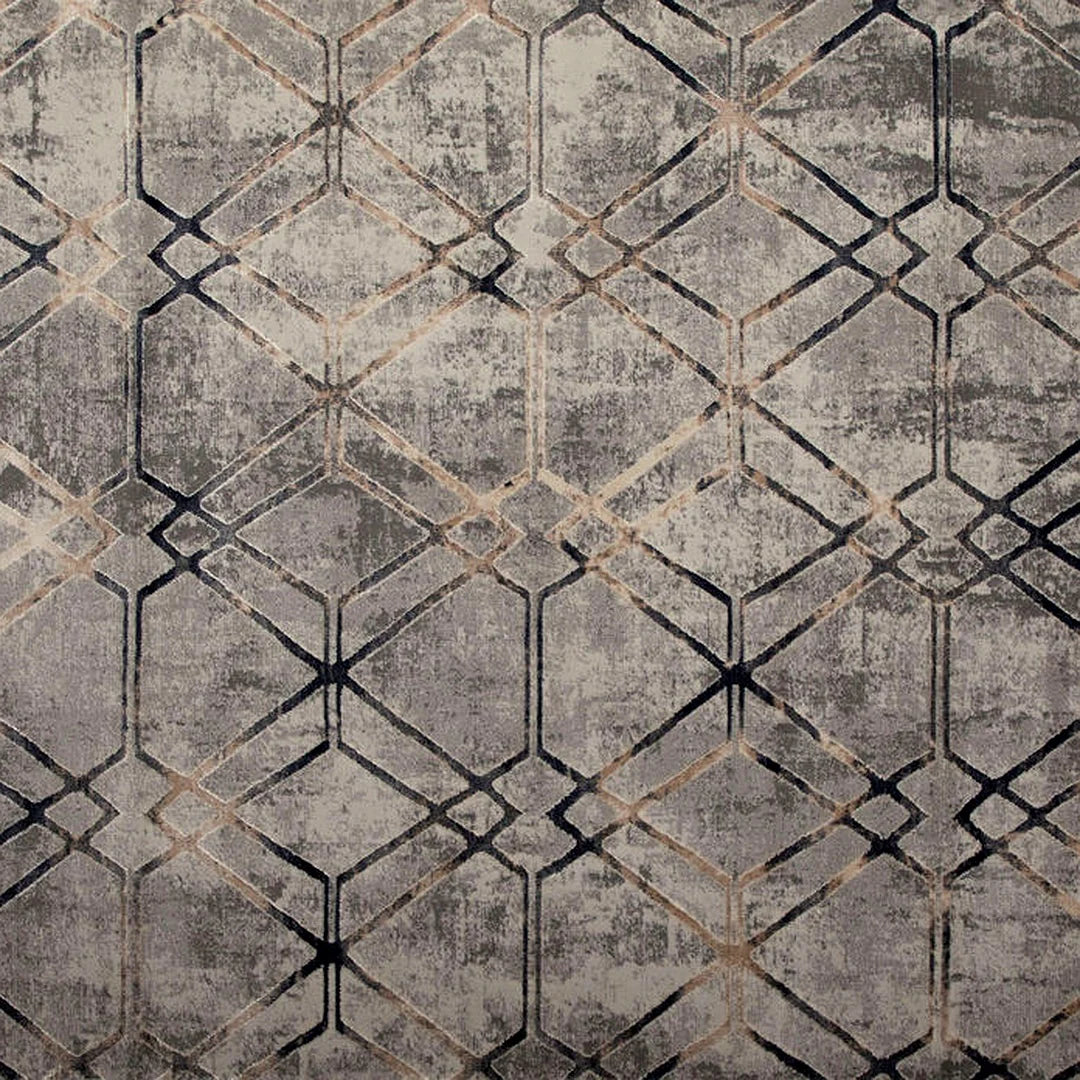 A close-up of a textured geometric pattern featuring a distressed diamond lattice design in shades of gray, beige, and black.