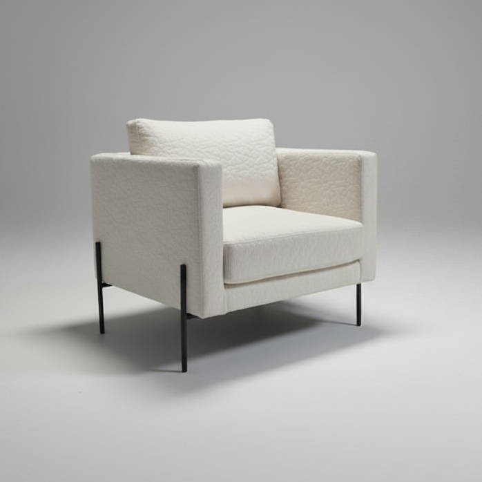 White armchair on a gray background