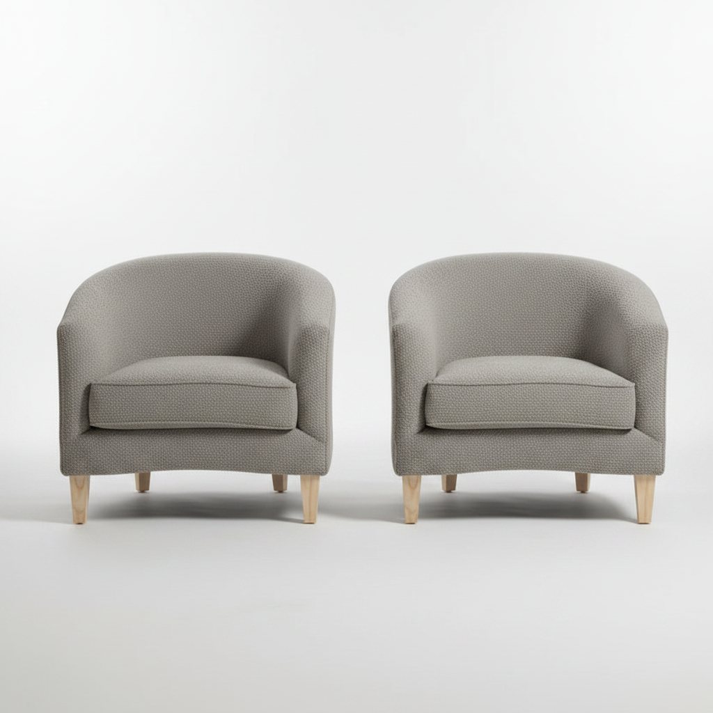 Two gray armchairs on a white background
