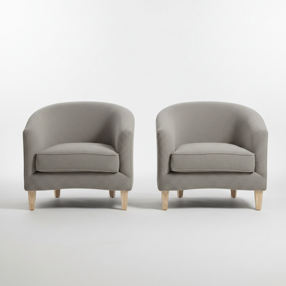 Two gray armchairs on a white background