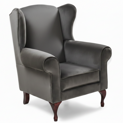 Gray wingback chair on a white background