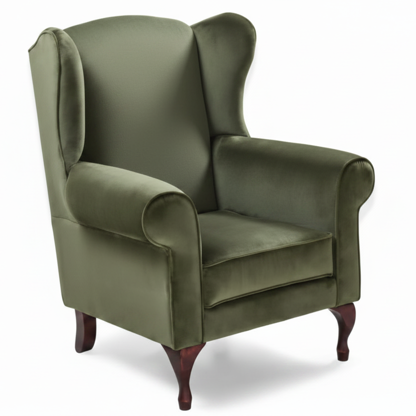 Green wingback chair on a white background