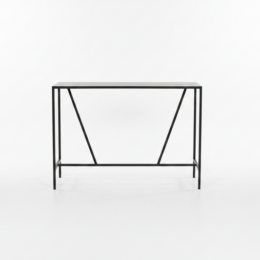 Minimalist black metal console table on a white background