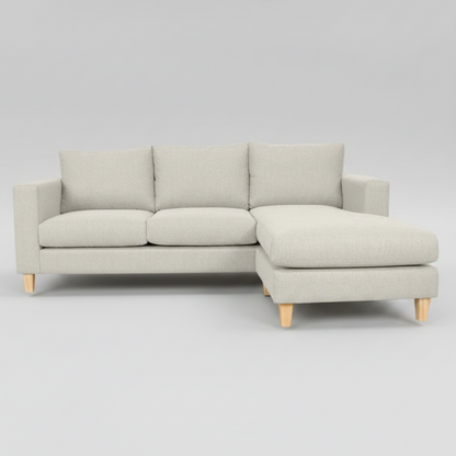 Beige sectional sofa on a light gray background