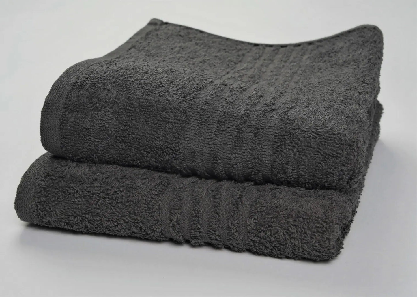 Soft and absorbent hand towel, perfect for drying hands in the bathroom.