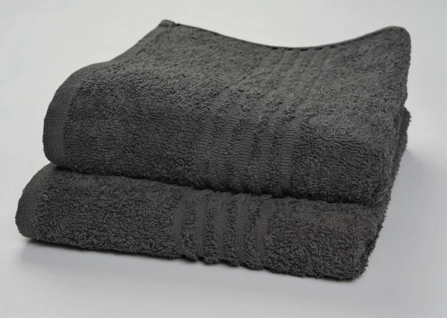 Soft and absorbent hand towel, perfect for drying hands in the bathroom.
