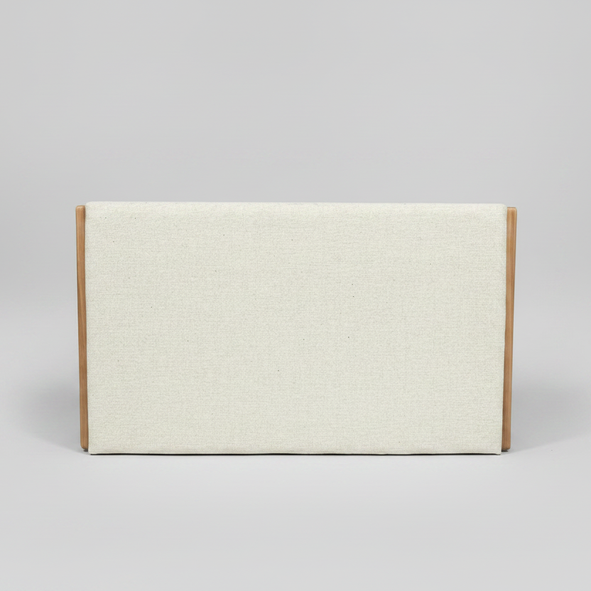 Headboard in cream with wooden sides on a gray background