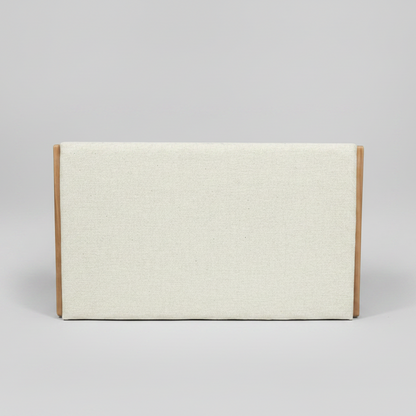 Headboard in cream with wooden sides on a gray background