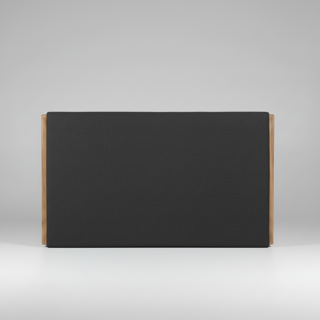 Black upholstered headboard with wooden sides on a gray background