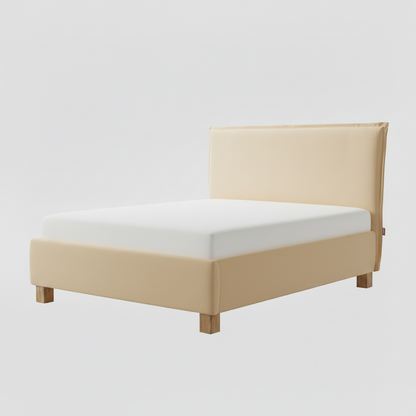 Navy bed frame with white mattress on a light gray background