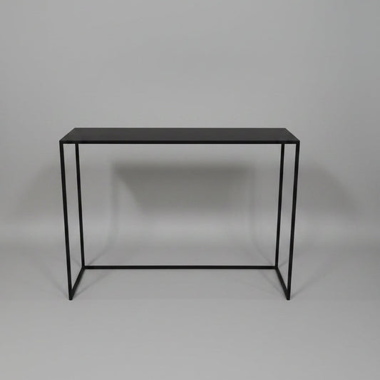 Matthew Server in black epoxy-coated steel, minimalist design.

