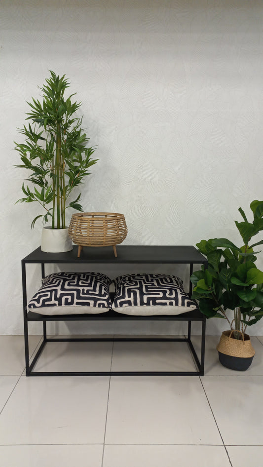 Metal console table in black steel with two shelves.