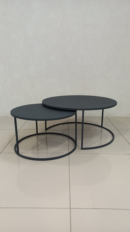 leek Black Round Nesting Table Set crafted from black epoxy-coated steel.