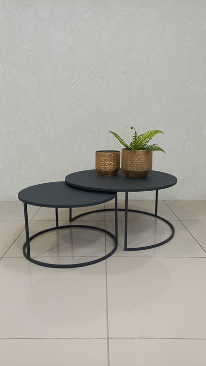 leek Black Round Nesting Table Set crafted from black epoxy-coated steel.
