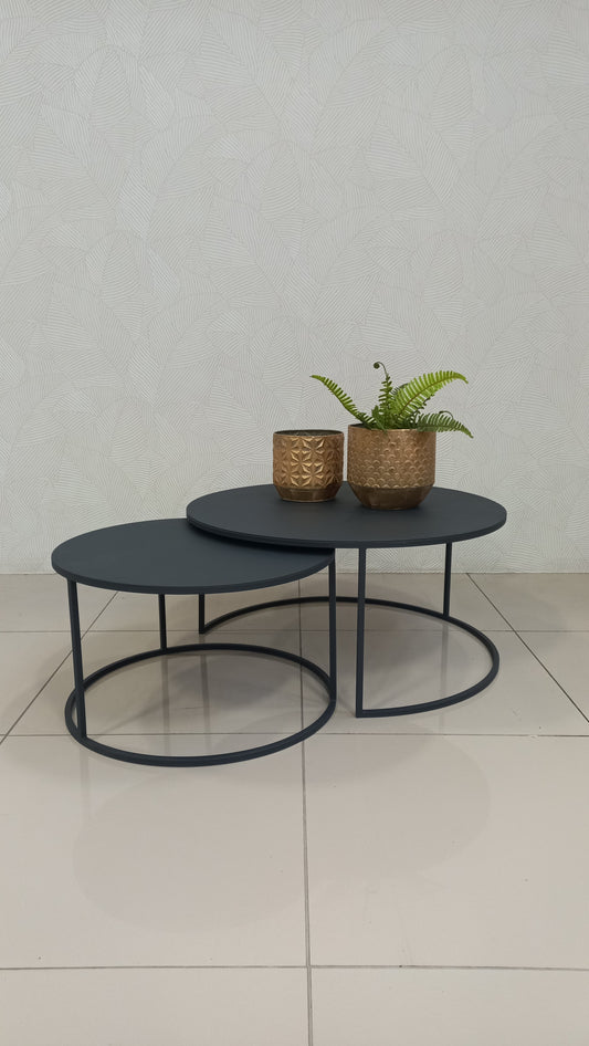 leek Black Round Nesting Table Set crafted from black epoxy-coated steel.