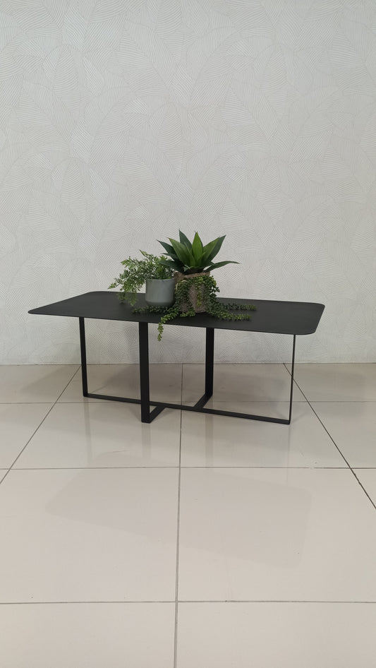 Zurich Black Steel Coffee Table with a modern rectangular design and curved corners.