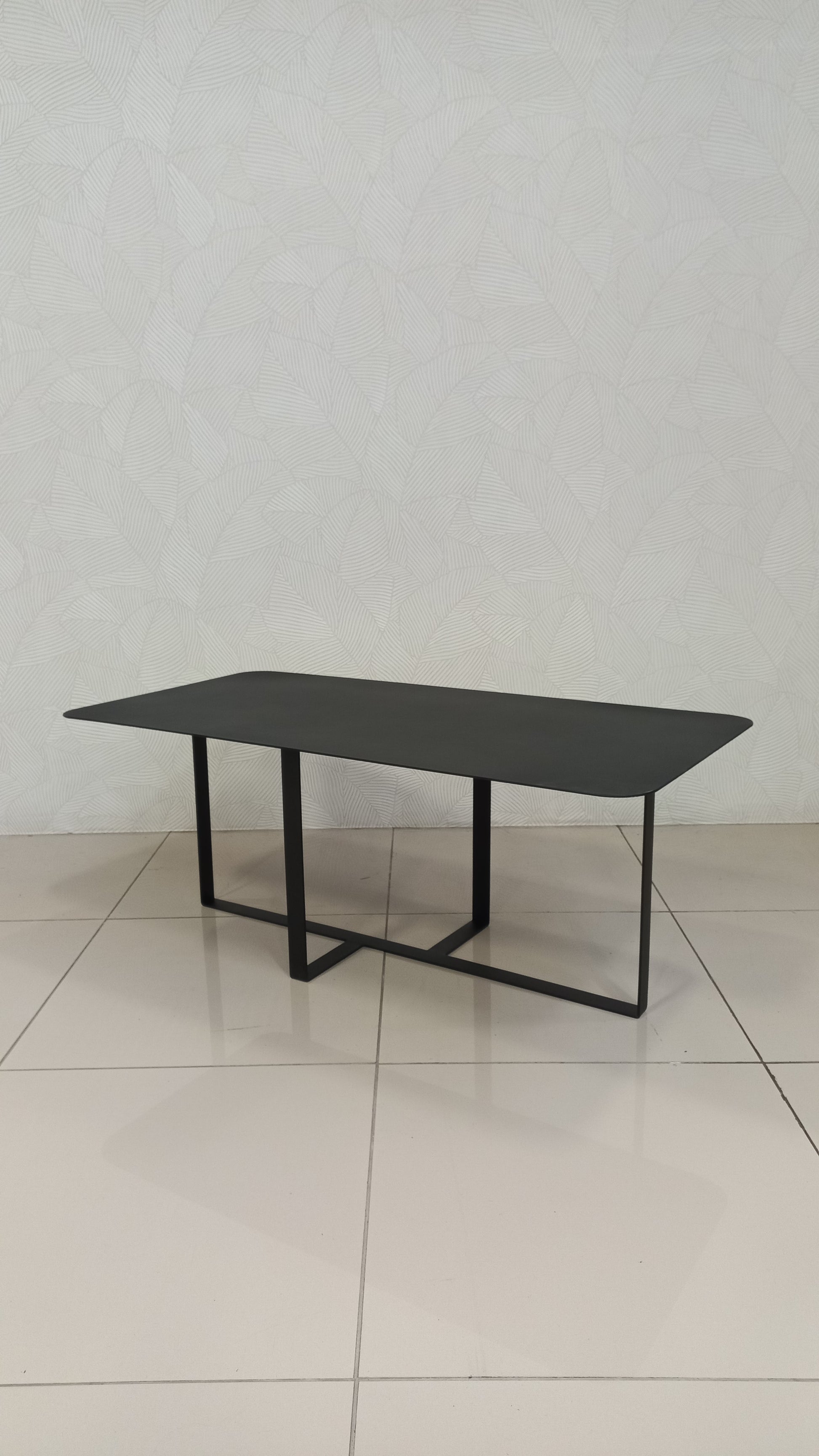 Zurich Black Steel Coffee Table with a modern rectangular design and curved corners.