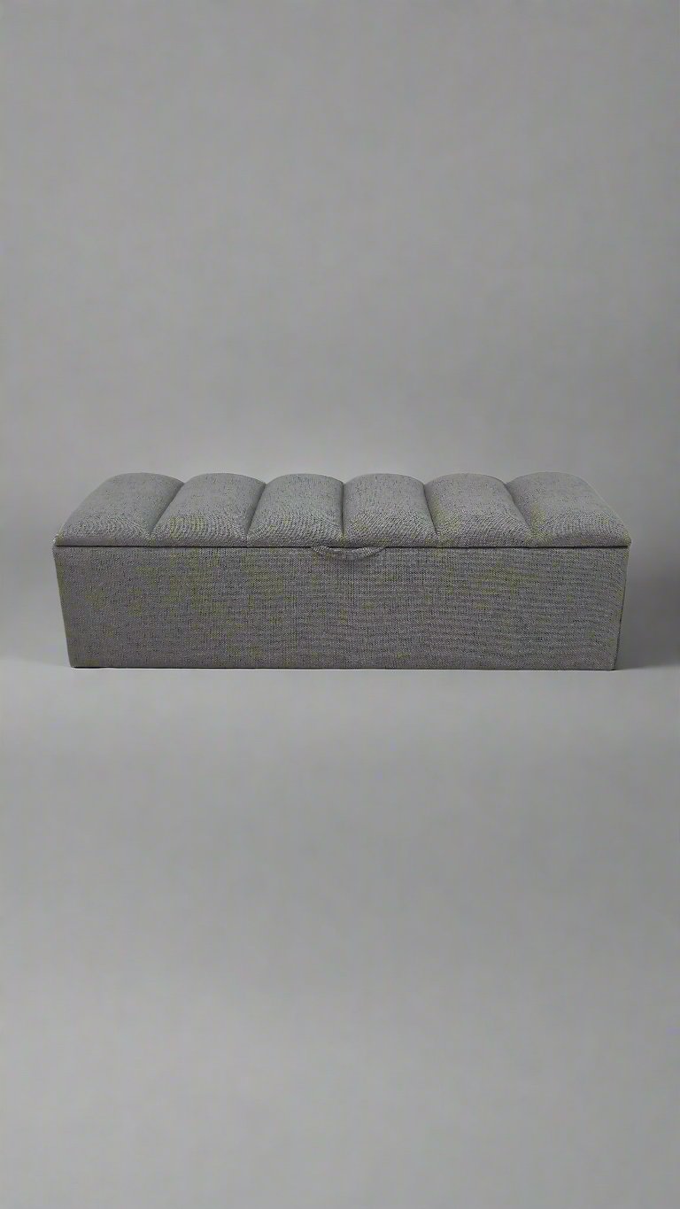 Fluted storage ottoman in grey