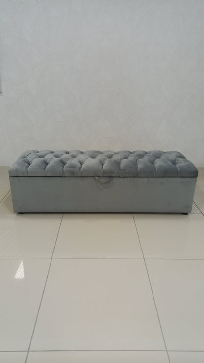 Deep Button Storage Ottoman with tufted lid and hidden storage.