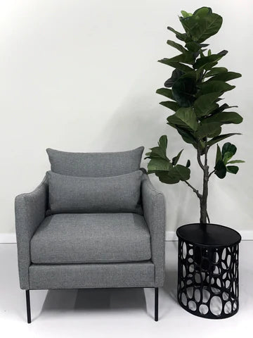 Carlo Armchair with upholstered seat and black steel frame.

