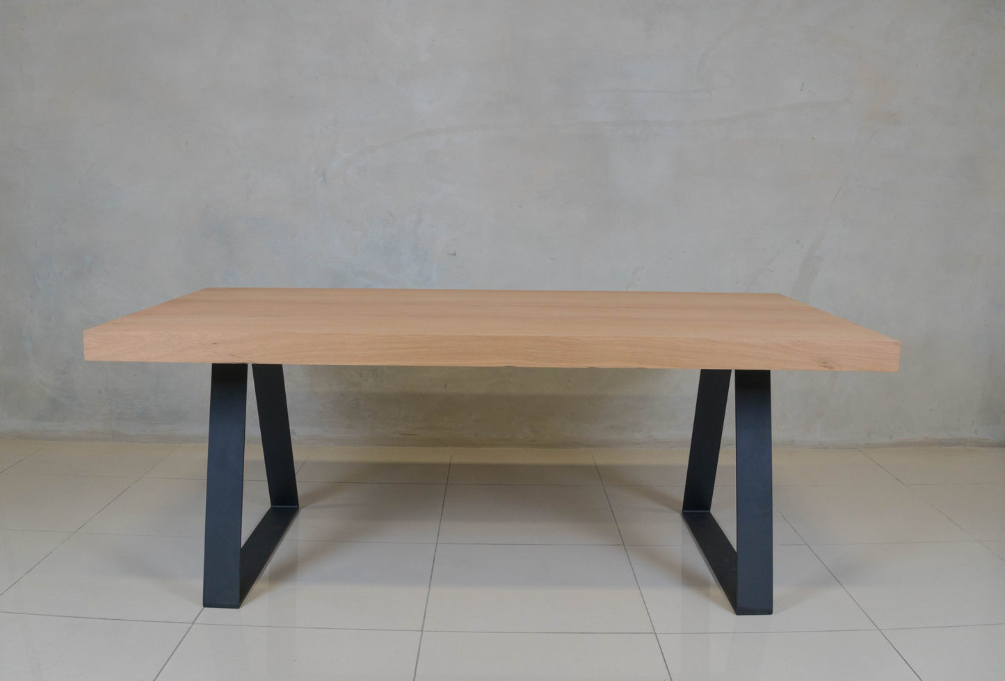 Modern oak veneer dining table, ideal for stylish family dining rooms.