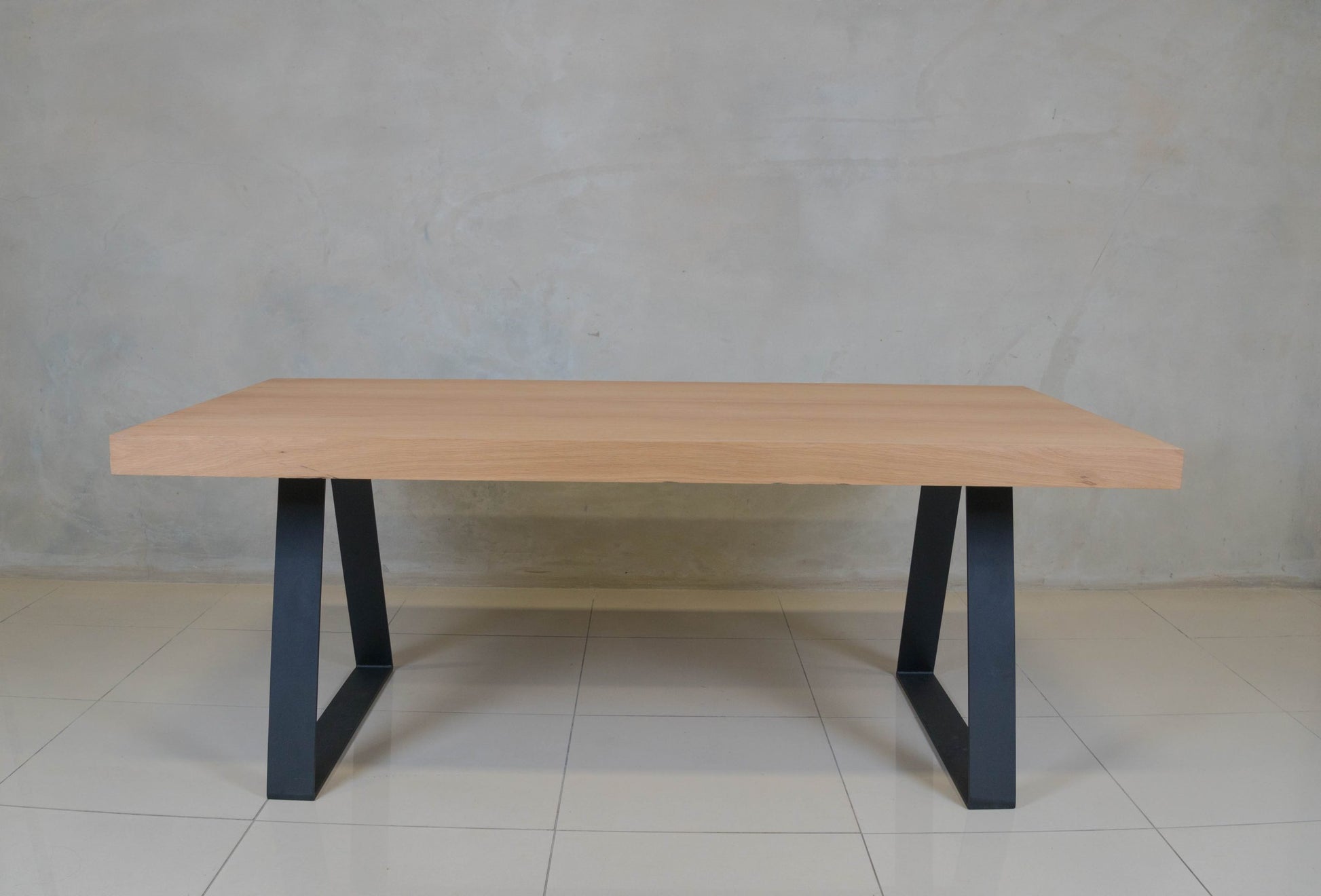 Modern oak veneer dining table, ideal for stylish family dining rooms.