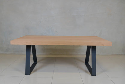 Modern oak veneer dining table, ideal for stylish family dining rooms.