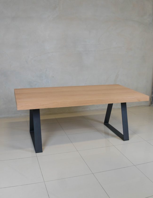 Modern oak veneer dining table, ideal for stylish family dining rooms.