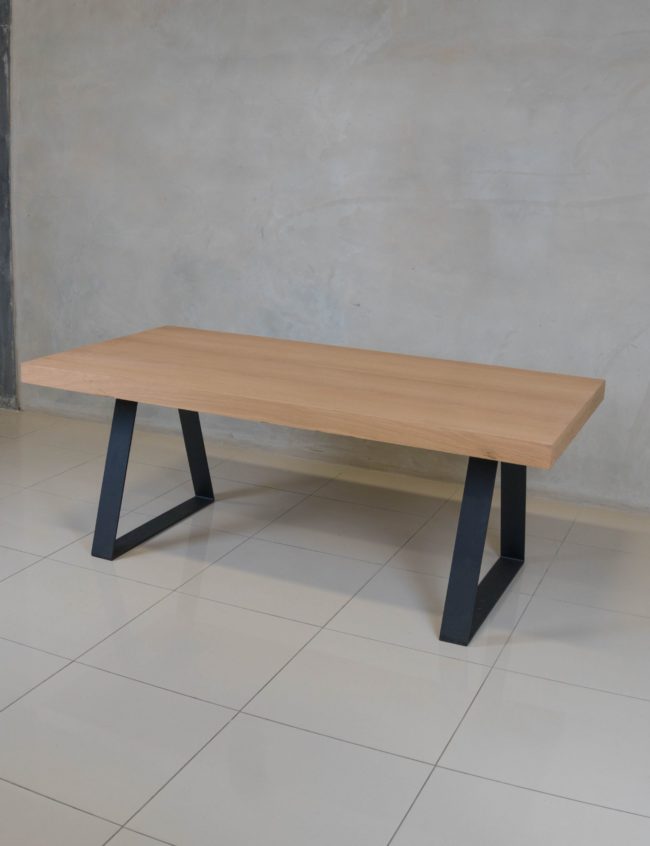 Modern oak veneer dining table, ideal for stylish family dining rooms.